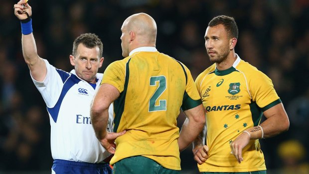 Nigel Owens shows Quade Cooper a yellow card during the Bledisloe Cup fixture in August.