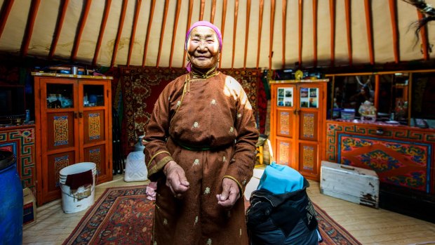 A Mongolian nomad inside her ger, 