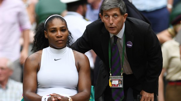 Not happy: Serena Williams discusses the state of play with Tournament Referee Andrew Jarrett.