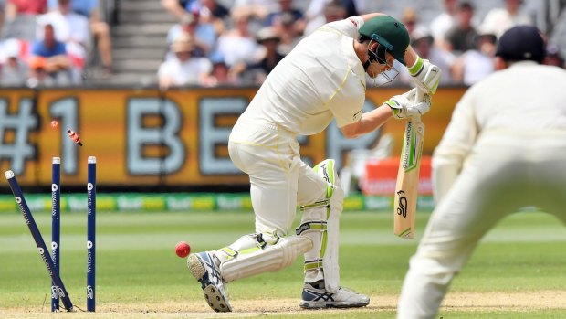 Australia's Cameron Bancroft chops onto his stumps off the bowling of England's Chris Woakes  in Melbourne on Friday.