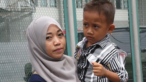 Yayah Heriyah says that when she was reunited with her husband Syahrial after his arrest in 2014, he had been so severely beaten that she did not recognise him.