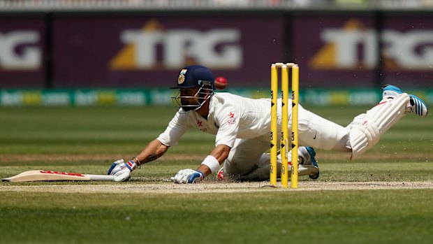 Just in: Virat Kohli dives to make his ground during the third Test. 