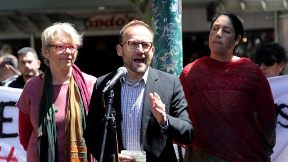 Greens MP Adam Bandt addresses protesters at a rally in Melbourne on Saturday.