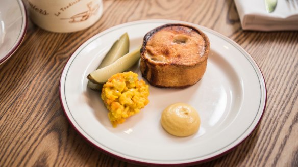 The pork pie with dijon and piccalilli is another of Kirk's British bar snacks. 