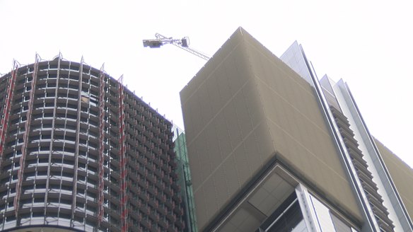 The crane dangling from Barangaroo's Tower One.