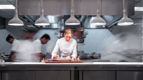 Clare Smyth in the kitchen at Core in London. The star chef will travel to Sydney to oversee the launch of Oncore.