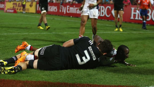 Winner: Perry Baker scores the decisive try against New Zealand.  