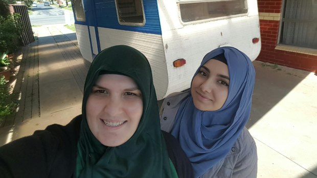 Betul Tuna (left) and her business partner Suzan Yilmaz with their 'caravan cafe', which they hope will become a meeting place in Shepparton for people of different faiths.