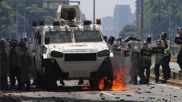 Protesters threw petrol bombs during a protest in Caracas on Saturday.