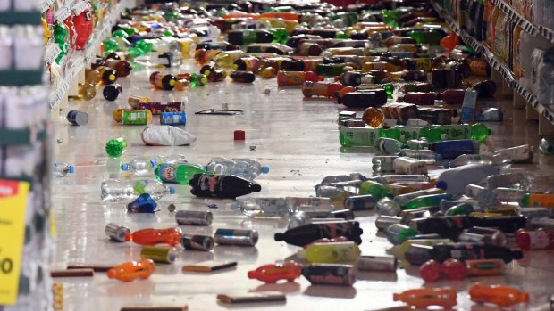 Groceries litter the aisle of a supermarket in Miramar. 