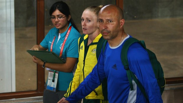 Sally Pearson (centre) and coach Eric Hollingsworth (right) during the 2010 Commonwealth Games.