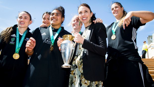 Cup runeth over: The Black Ferns hold 'Nancy', a relative of the men's World Cup trophy, 'Bill'.