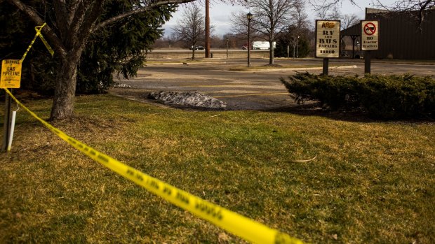 Police tape is seen outside a Cracker Barrel restaurant in Kalamazoo, Michigan on Sunday.