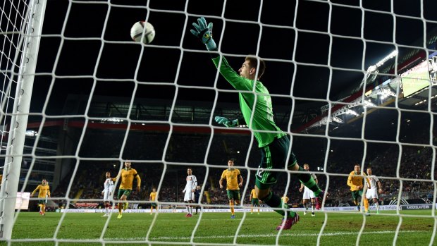 Germany goalkeeper Zieler cannot stop Jedinak's screamer.