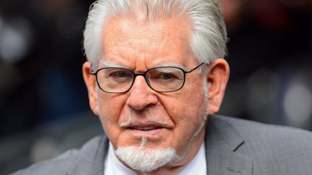 Rolf Harris arrives at Southwark Crown Court in London to be sentenced in July 2014. 