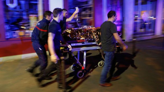 A person is evacuated after the shooting in Bataclan theatre in Paris in November. 