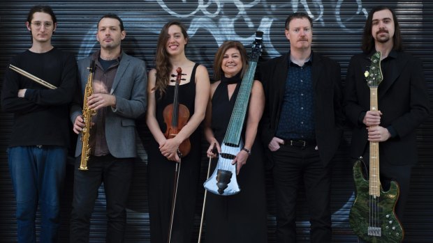 The jazz-influenced group Elysian Fields, with viola da gamba player Jennifer Eriksson (fourth from left).