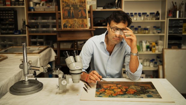 David Stein is restoring the painting by renowned Australian artist Margaret Olley.