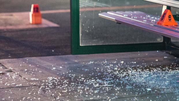 Shattered glass at the scene of the shooting at Caulfield South.