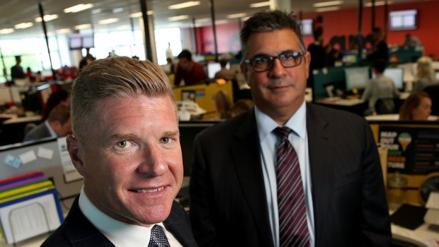 Andrew Demetriou, right, with John Wall, chief executive of Acquire Learning, which has been accused of taking advantage of vulnerable consumers.
