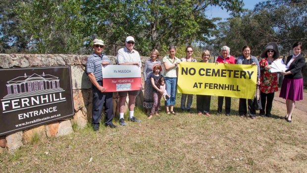 Tanya Davies, the local member for Mulgoa (pictured far right), met with residents at the entrance to Fernhill estate on Wednesday to receive a petition containing over 1000 signatures opposing the proposal to convert the historic estate into a cemetery.