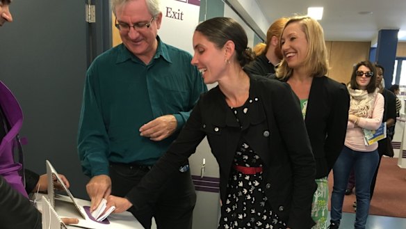 Andrew Bartlett, the Greens' Brisbane candidate Kirsten Lovejoy and Senator Larissa Waters voting at Brisbane Central State School.