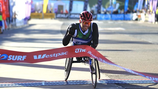 Kurt Fearnley wins the wheelchair division. 