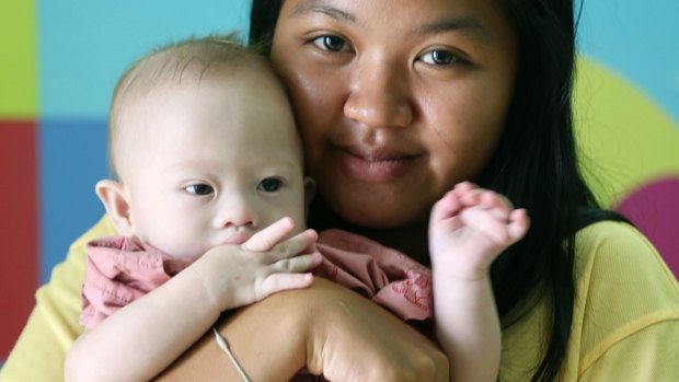 Thai surrogate mother Pattharamon Janbua with baby Gammy.