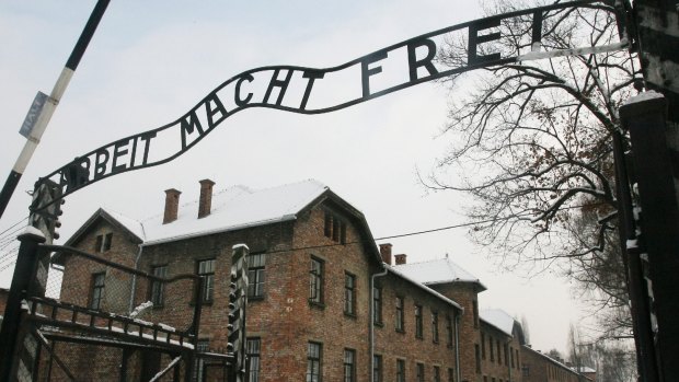 'Work Sets You Free': the main entrance to the former Nazi death camp Auschwitz Birkenau, in Oswiecim, southern Poland. About 30,000 Israeli high-school students go on organised week-long trips to Poland every year. A group of travel agencies have been arrested for alleged price fixing for the school trips.