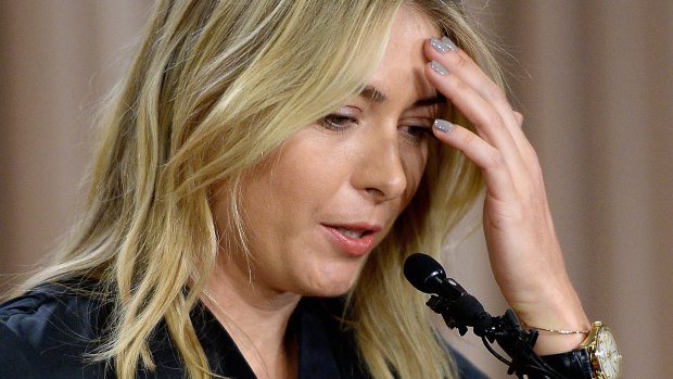 Maria Sharapova reacts as she addresses the media regarding a failed drug test.