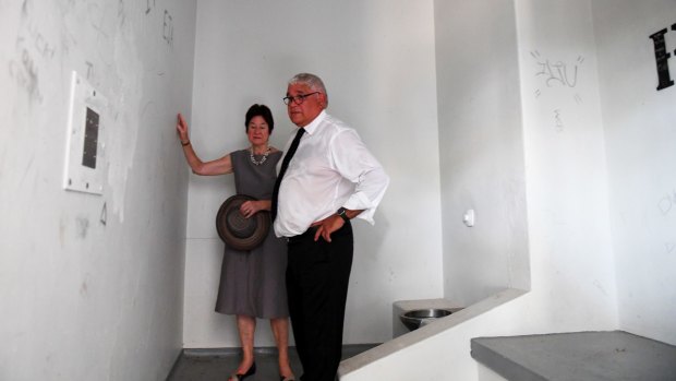 Royal commissioners Mick Gooda and Margaret White inside Dylan Voller's cell during a tour of the former Don Dale Youth Detention facilities. 