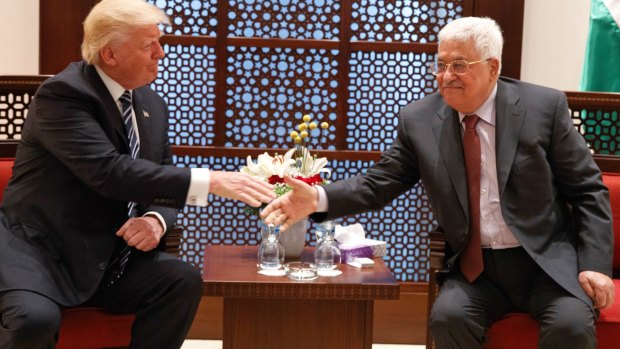 US President Donald Trump, left, meets with Palestinian President Mahmoud Abbas in May.