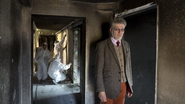 Volker Herzog, the mayor of Vorra in Germany, in a house that was to shelter refugees before it was burned in an arson attack in March.