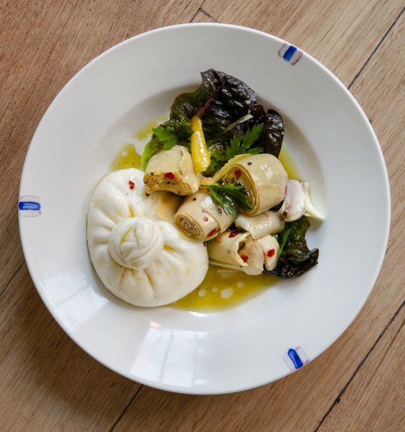 Burrata with artichokes and nettle oil.