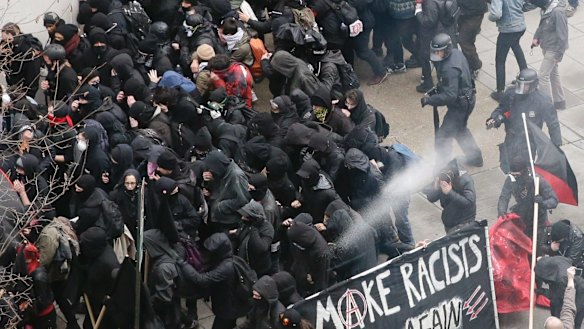 Police use pepper spray on protesters in Washington.