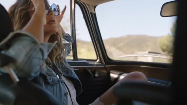 The ad was called "irresponsible" by viewers and slammed for promoting unsafe driving.