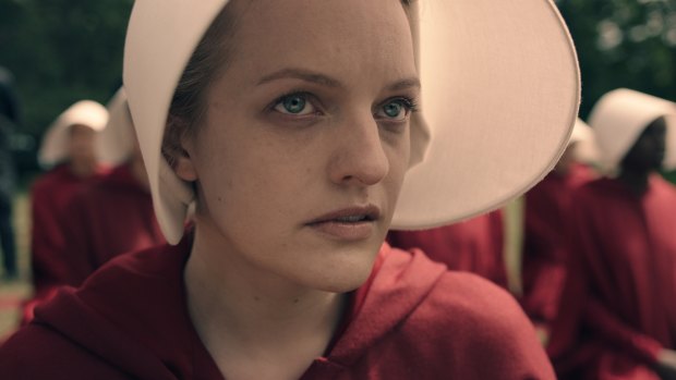 Actor Elisabeth Moss in The Handmaid's Tale, which helped raise the profile of Cigarettes After Sex when it used one of the band's songs in the show.