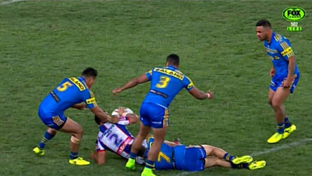 Blow-up: Ken Sio passed on the ground after it seemed he had been held in a tackle, angering the Eels. 