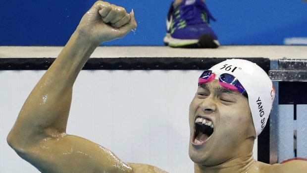 China's Sun Yang celebrates after winning gold.