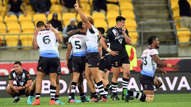 Magic moment: Fiji celebrate their 4-2 defeat of New Zealand.