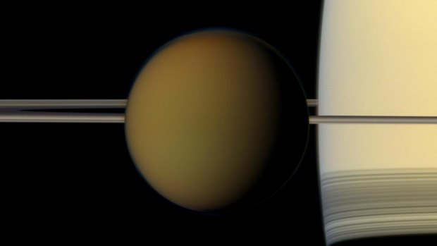 Titan passing in front of Saturn and its rings in an image released by NASA.