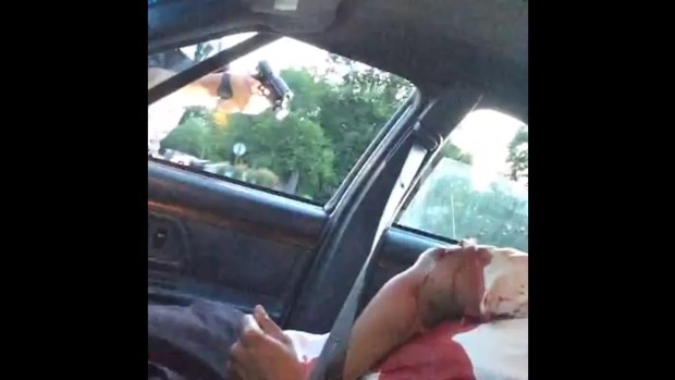 A still from the Facebook live video showing a police officer shooting Philando Castile.