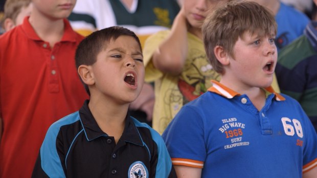 Kyh (left) lets rip during rehearsals for the Moorambilla Voices choir in the documentary <i>Wide Open Sky</i>.