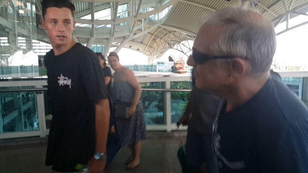 Jamie Murphy and his father Brendan arrive at Denpasar International Airport.