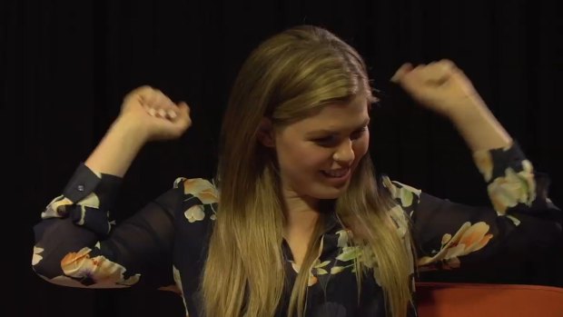 Belle Gibson as she appears in the video. 