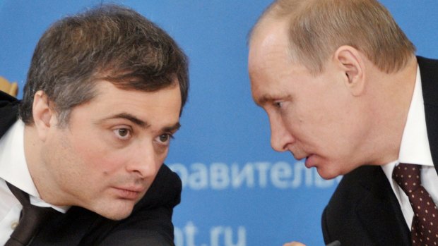Russian Prime Minister Vladimir Putin, right, speaks to Vladislav Surkov, credited with converting Russian public life into a huge guessing game.