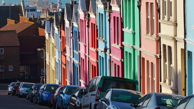 Early morning casts shadows and illuminates colourful houses in Brighton. 