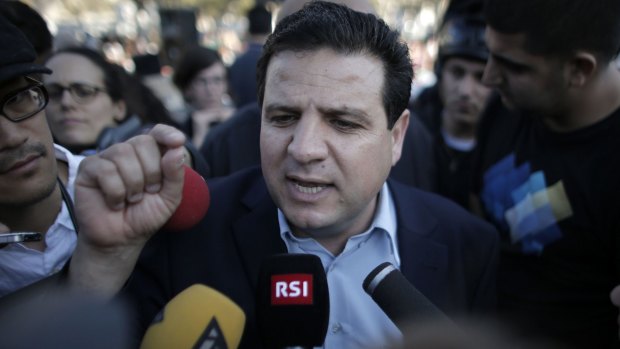 Ayman Odeh answers questions in Jaffa.  