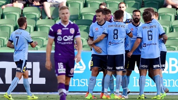 Sydney FC celebrate a goal during their 3-0 win against Perth Glory on Sunday. 