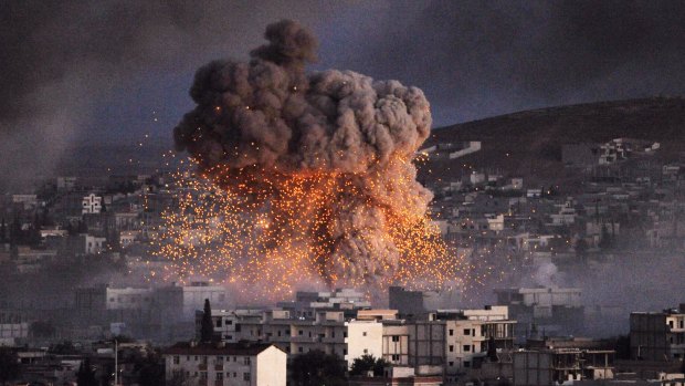 An explosion rocks the Syrian town of Kobane during a battle between Islamic State and the Kurdish forces last year.